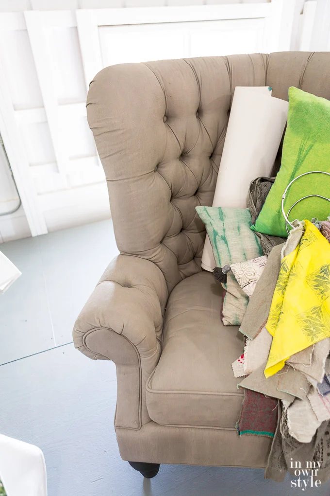 an upholstered chair painted with Annie Sloan chalk paint in French Linen