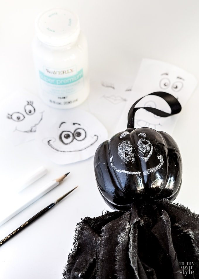 How to draw a funny face on a halloween pumpkin