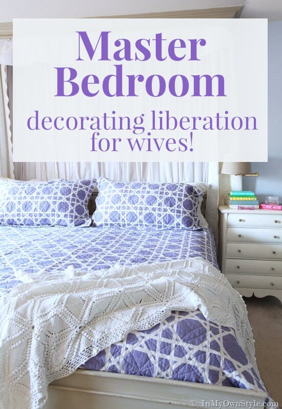Purple quilt on master bedroom bed. Text overlay says Master Bedroom decorating liberation for wives!