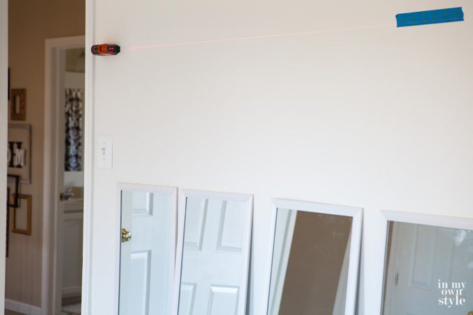 How-to-hang-multiple-pieces-of-art-or-mirrors-level-on-a-wall