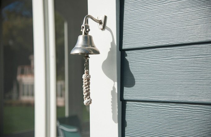 Silver bell on house with Hardie plank siding