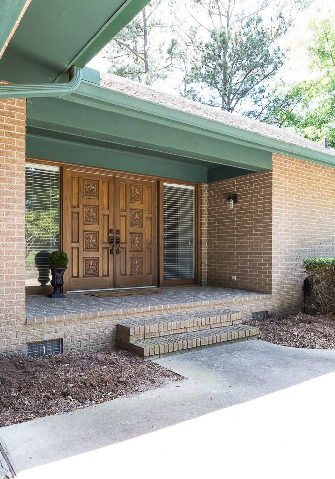 Front exterior steps of 1970's lake house