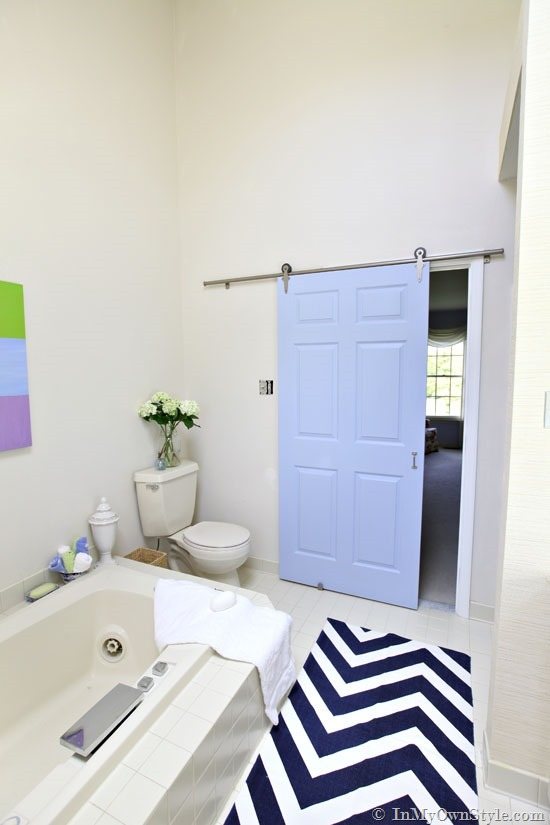 Large-Bathroom-Decorating-Ideas---Install-a-Rolling-Door-from-Rolling-Door-Designs