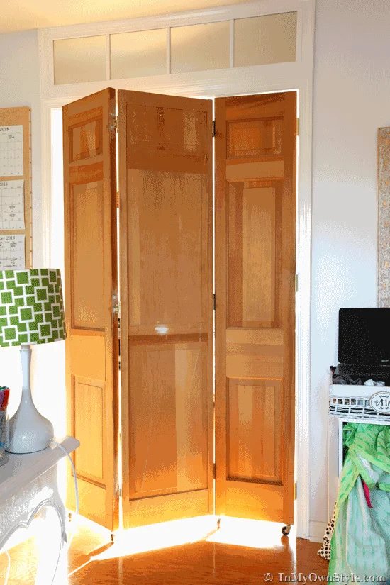 DIY Rolling door made using bifold doors