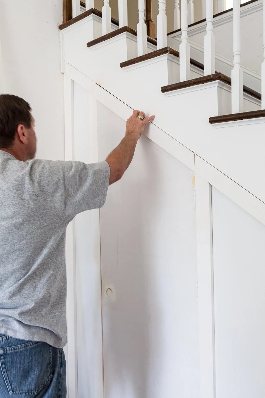 Under a staircase hidden storage