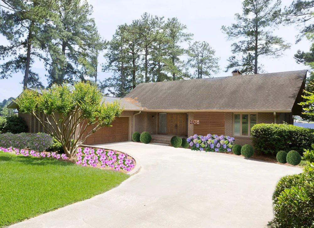 Outside of a home that was just painted tan from a dark teal color