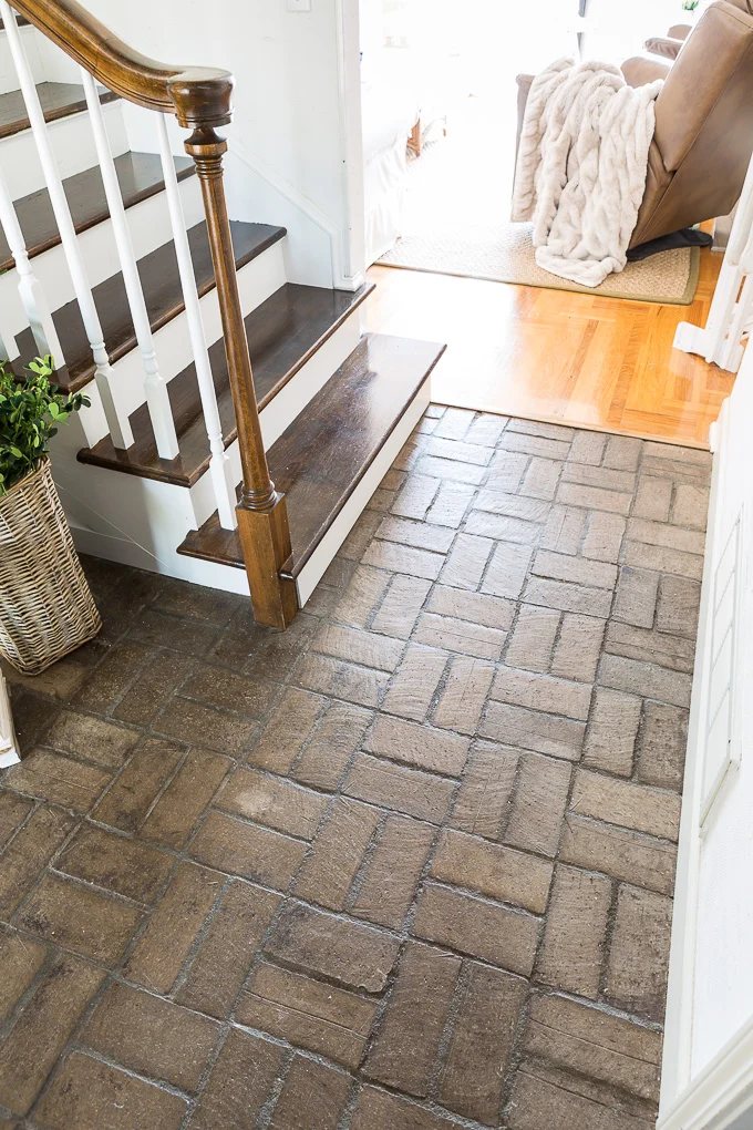 Brick floor where it meets wood floor
