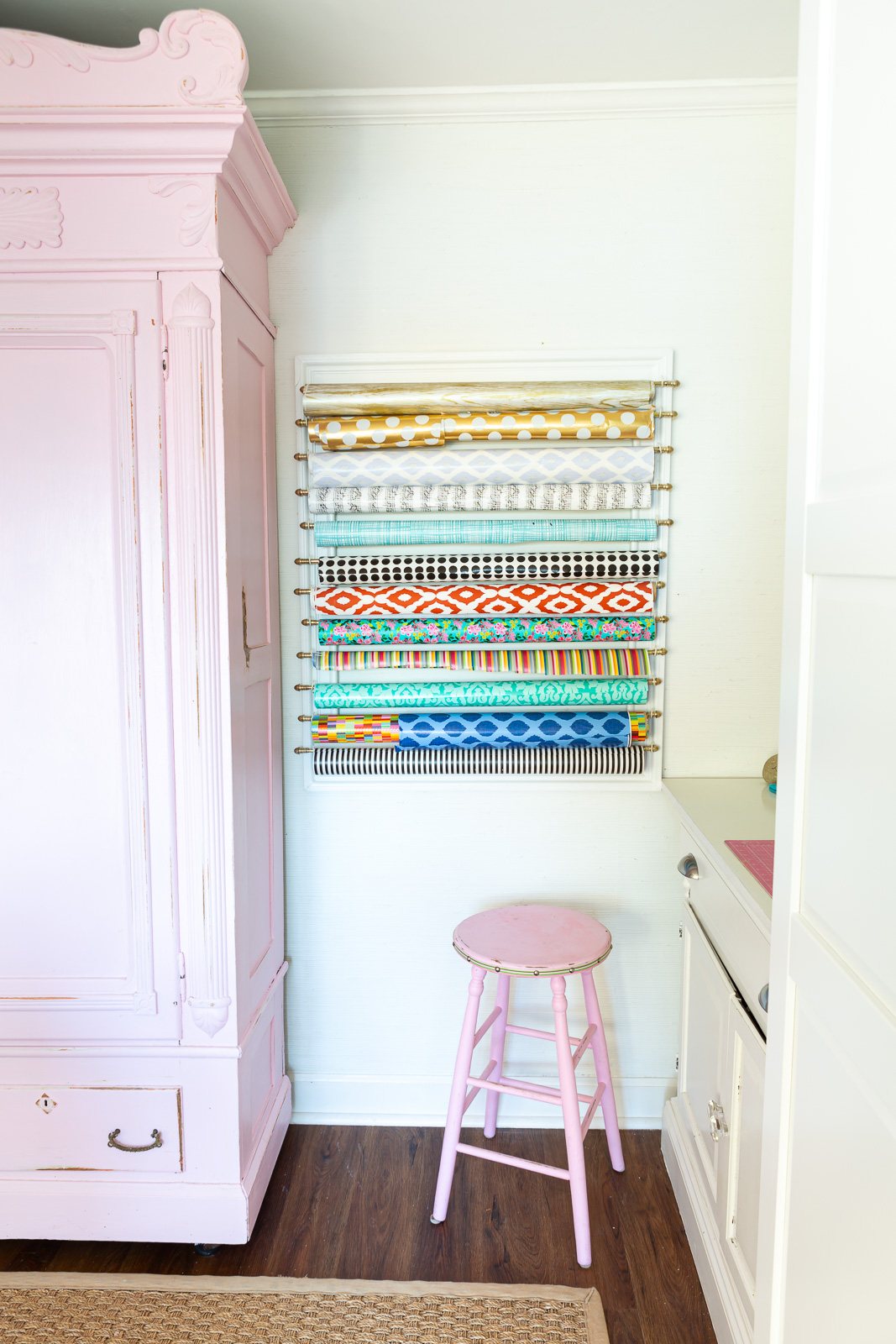 How to make a wall holder for rolls of gift wrap.