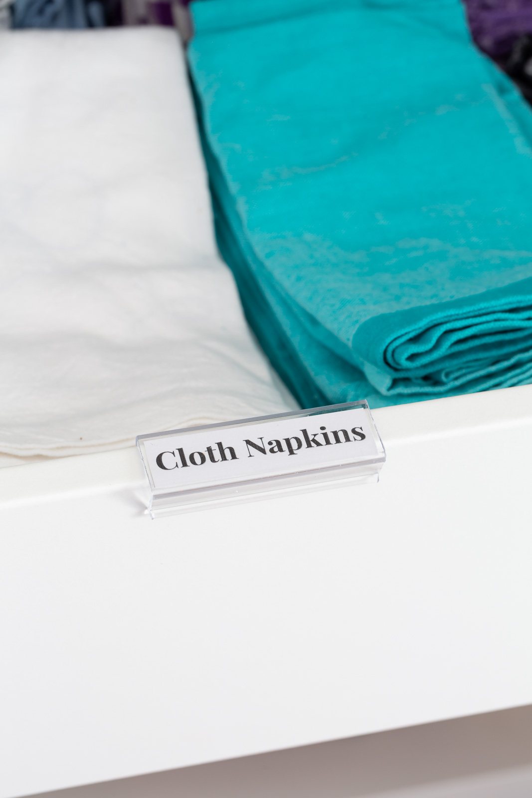 IKEA PAX with added label saying cloth napkins on drawers