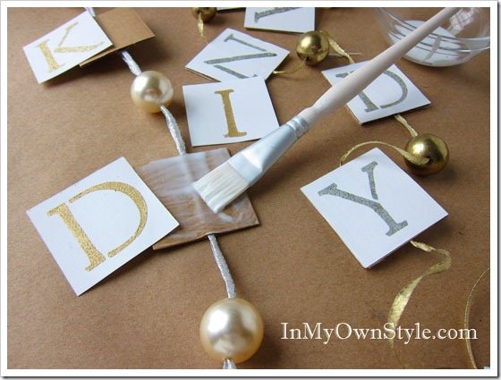Glue-Monograms-onto-Cardboa