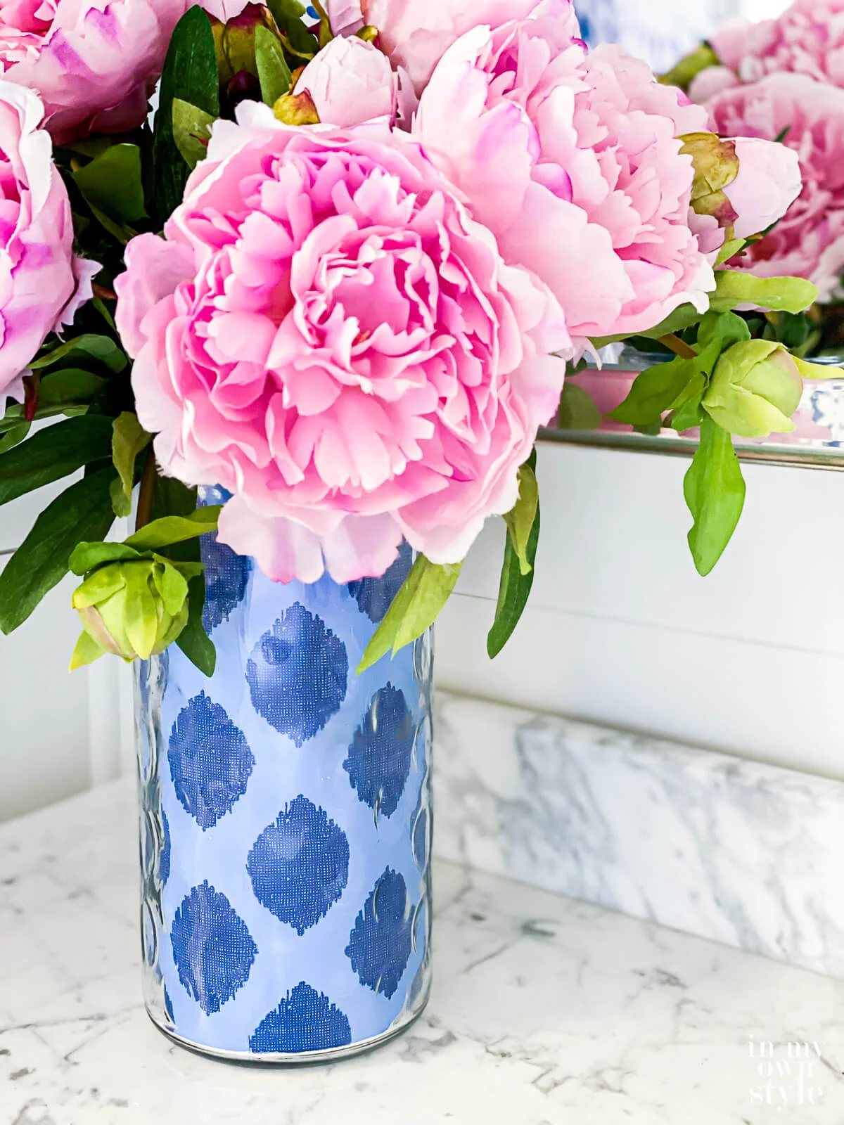 Tall clear glass vase instantly changed into a colorful patterned vase to match your decor.