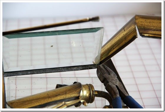 taking apart brass light fixture to repurpose the glass to make a pretty DIY paperweight.