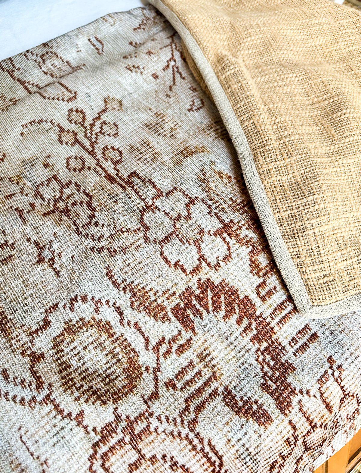 close up of fall colored throw pillow covers from Pottery Barn
