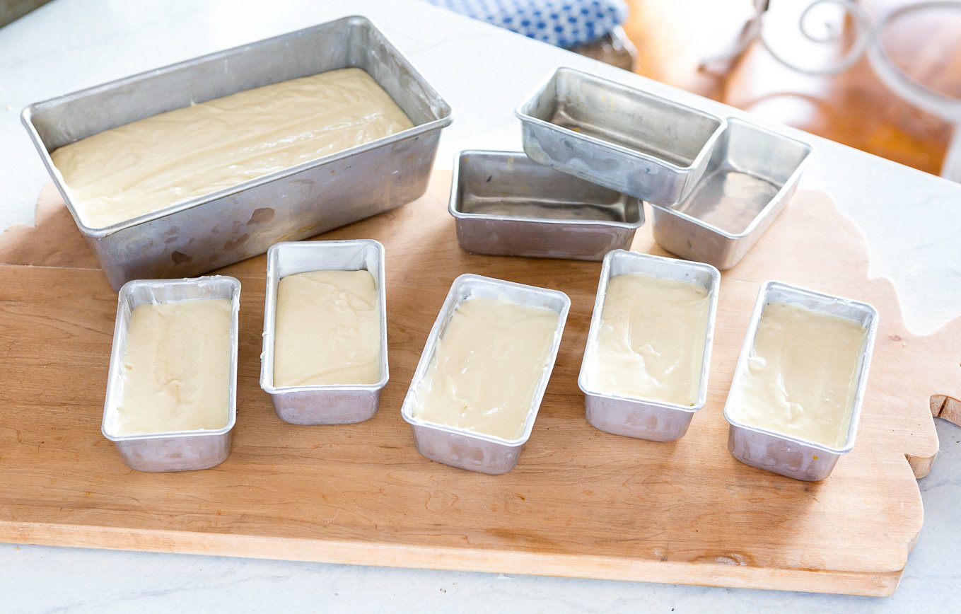 Mini loaf pans filled with Old Fashioned Lemon Pound Cake batter