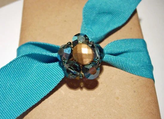 Vintage clip on earring used to embellish a gift
