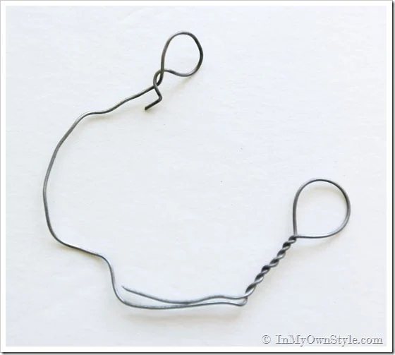 How to make a wire hook to hold TV cords to hide them.