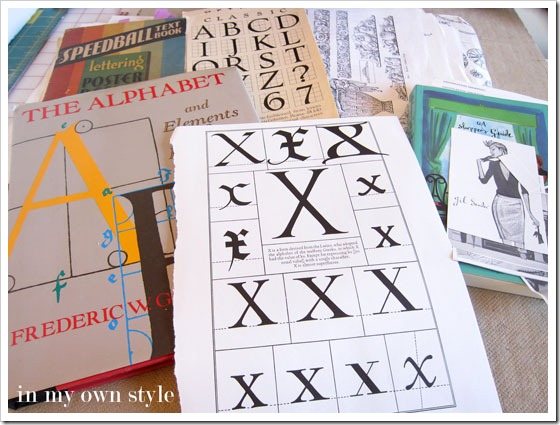 Books with black and white letter illustrations