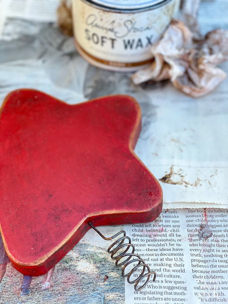 DIY Wood star tree topper painted red with soft wax