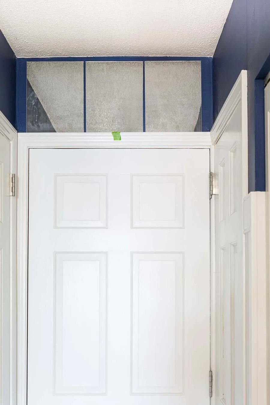 How to create a fake transom above a door using mirrors