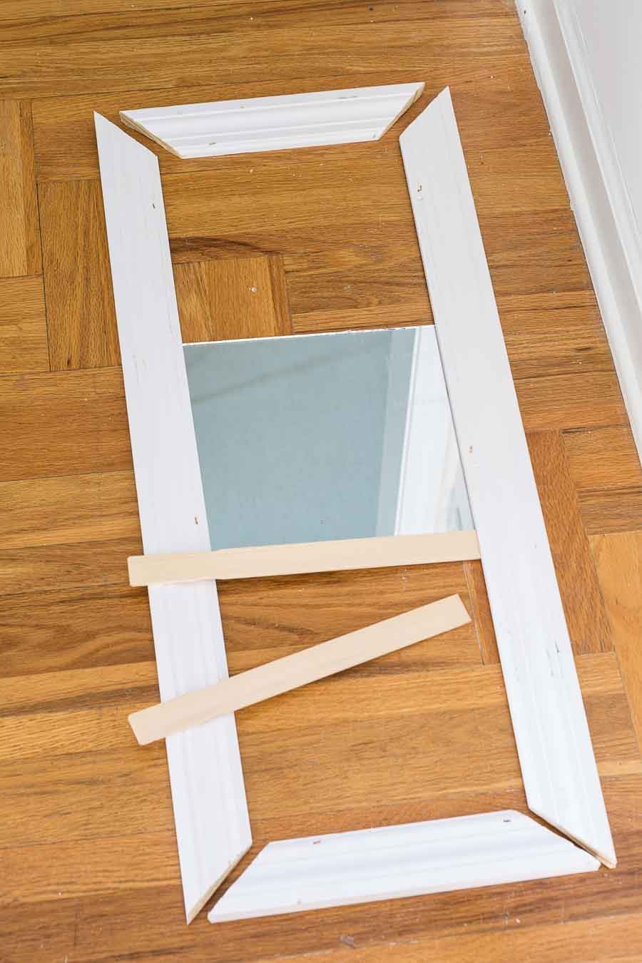How to make a fake transom over a door or window using trim molding and mirrors