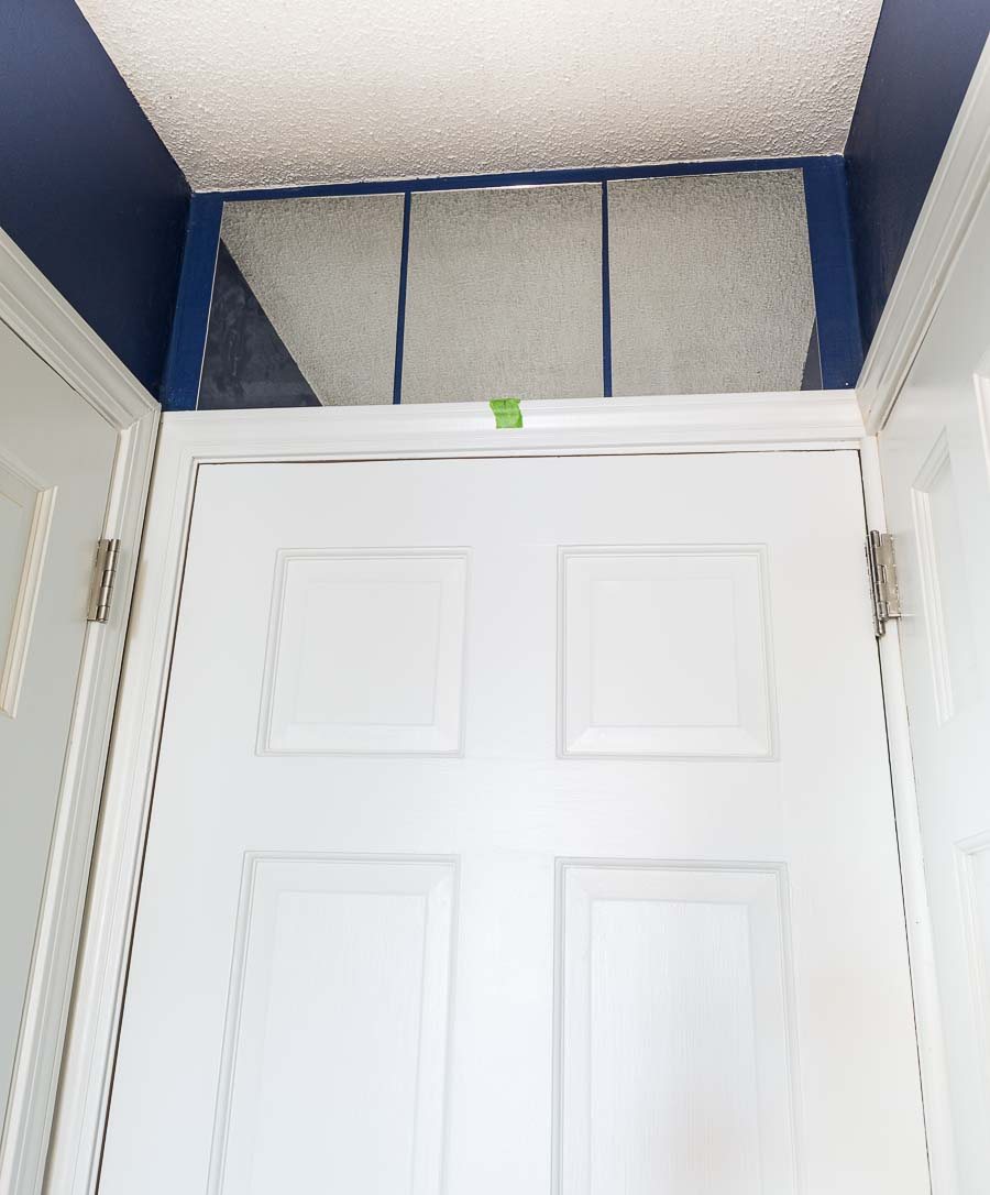 How to use mirror tiles to create a fake transom over a door