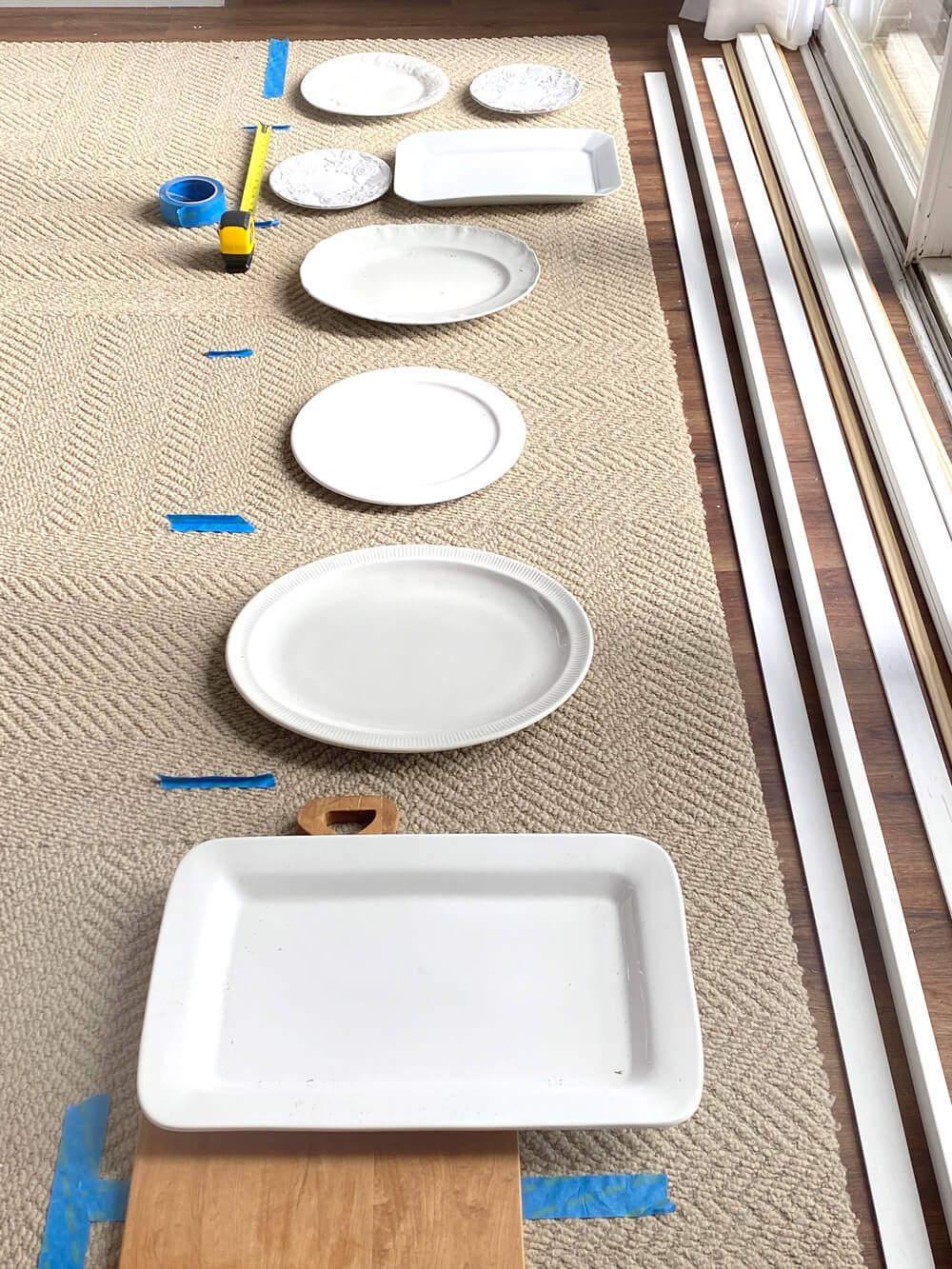 Figure out how to space your shelves when making a plate rack for a wall.
