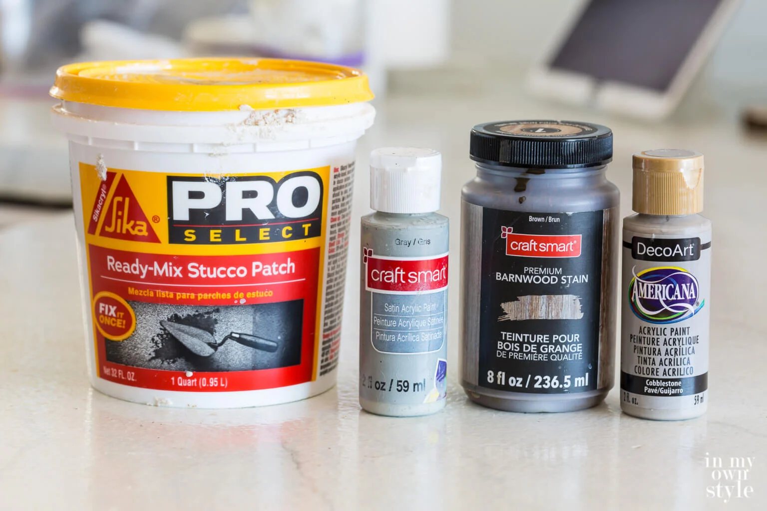 Paints and materials used to transform a dated thrift store planter to a trendy planter.
