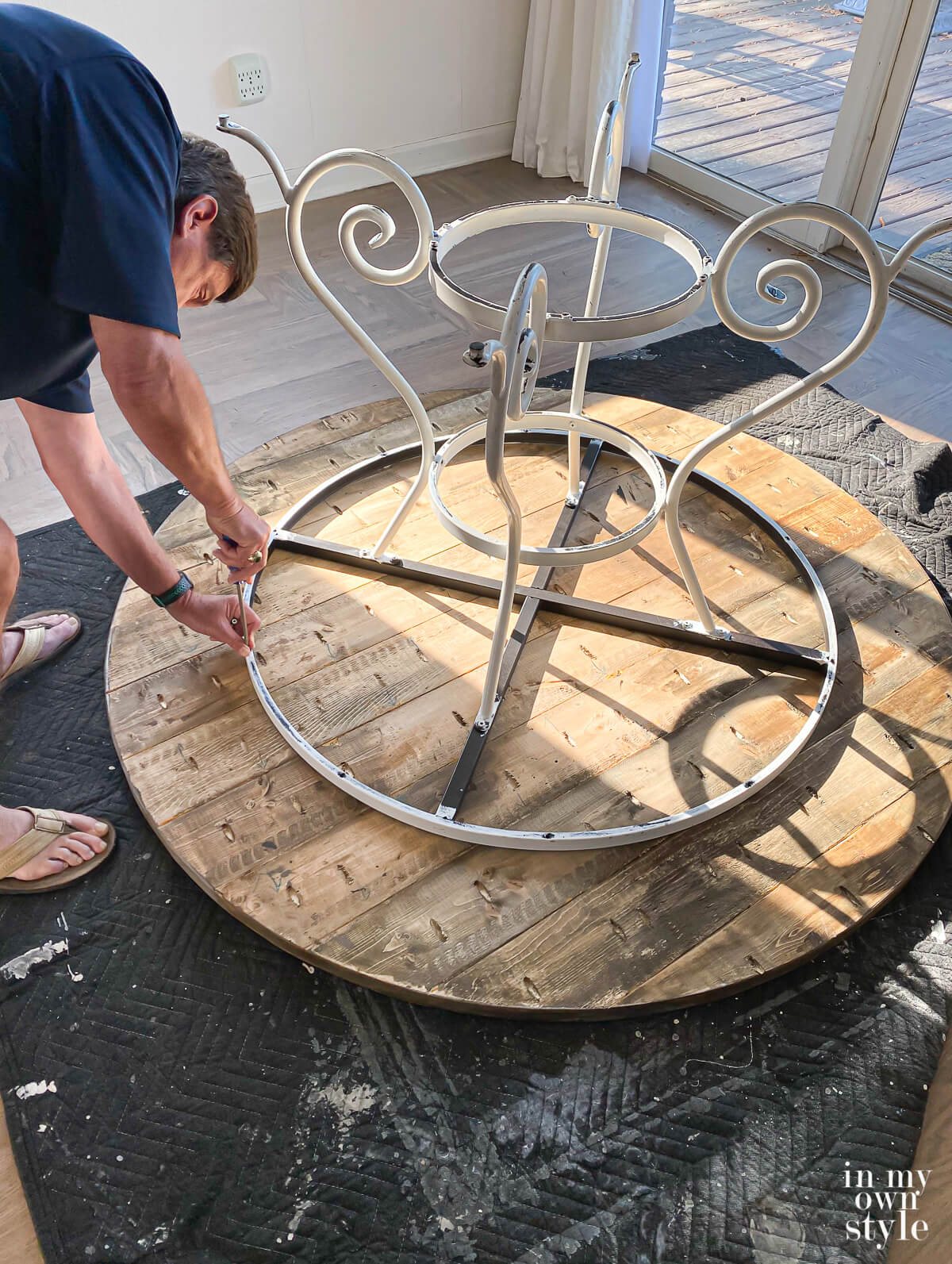 how to attach a DIY round wood table to an existing metal table base.