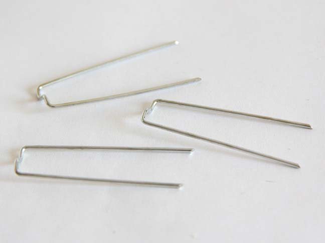 Floral picks to attach spring fabric to wreath.