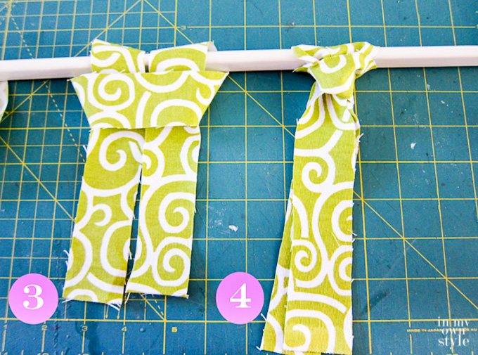 Tied on strips of fabric on rod