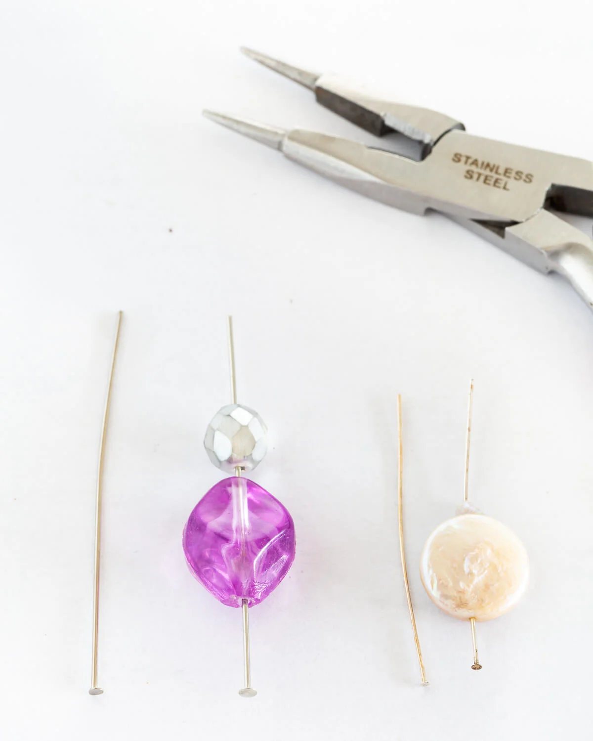 Beads on endpins to make drop earrings for pierced ears