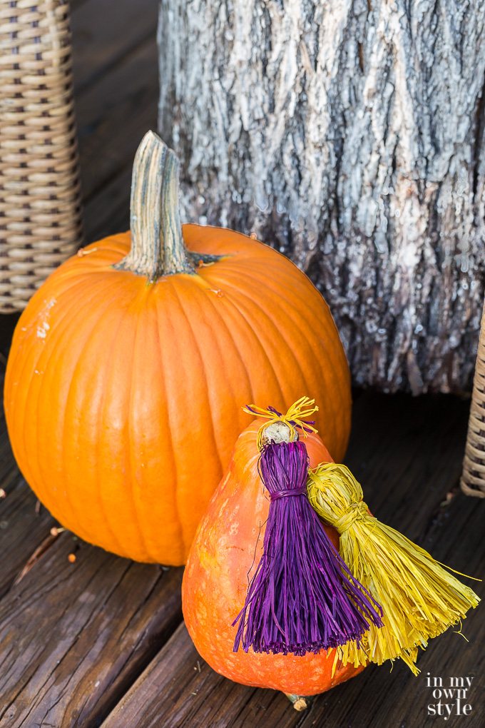 No carving pumpkin decorating ideas. Add a raffia tassel or two.