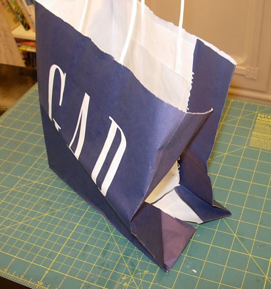 How to cover a book with a shopping bag
