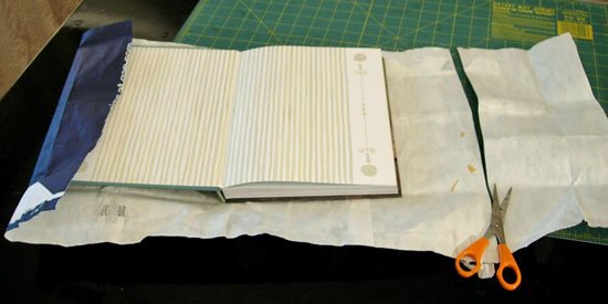 How to cover a text book with a paper bag