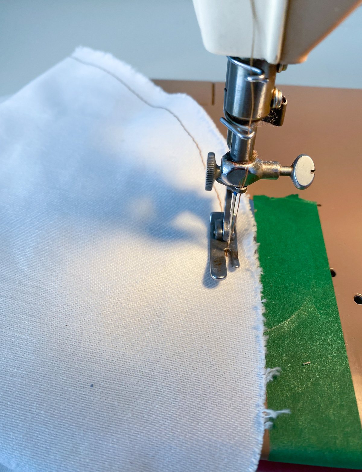 sewing an outline stitch on letter appliques