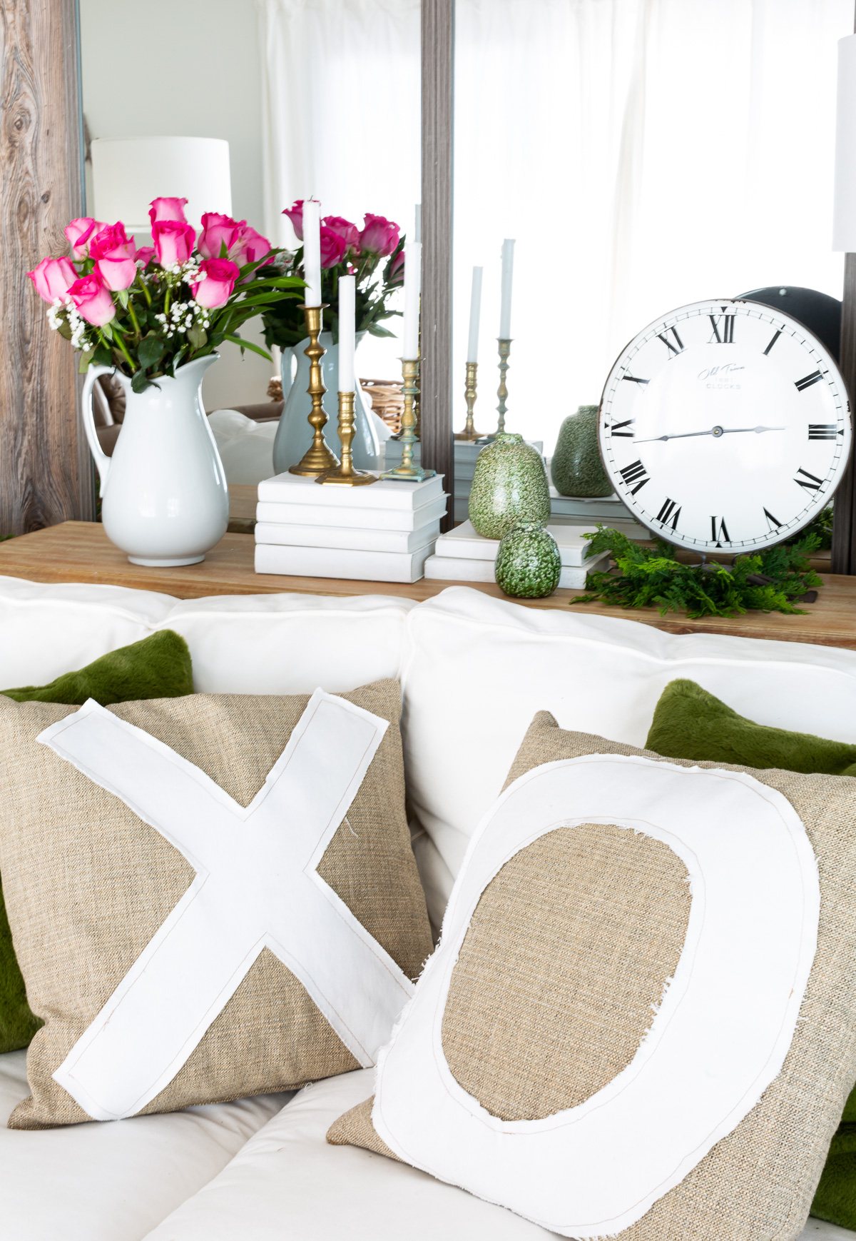 x and o throw pillows on a sofa