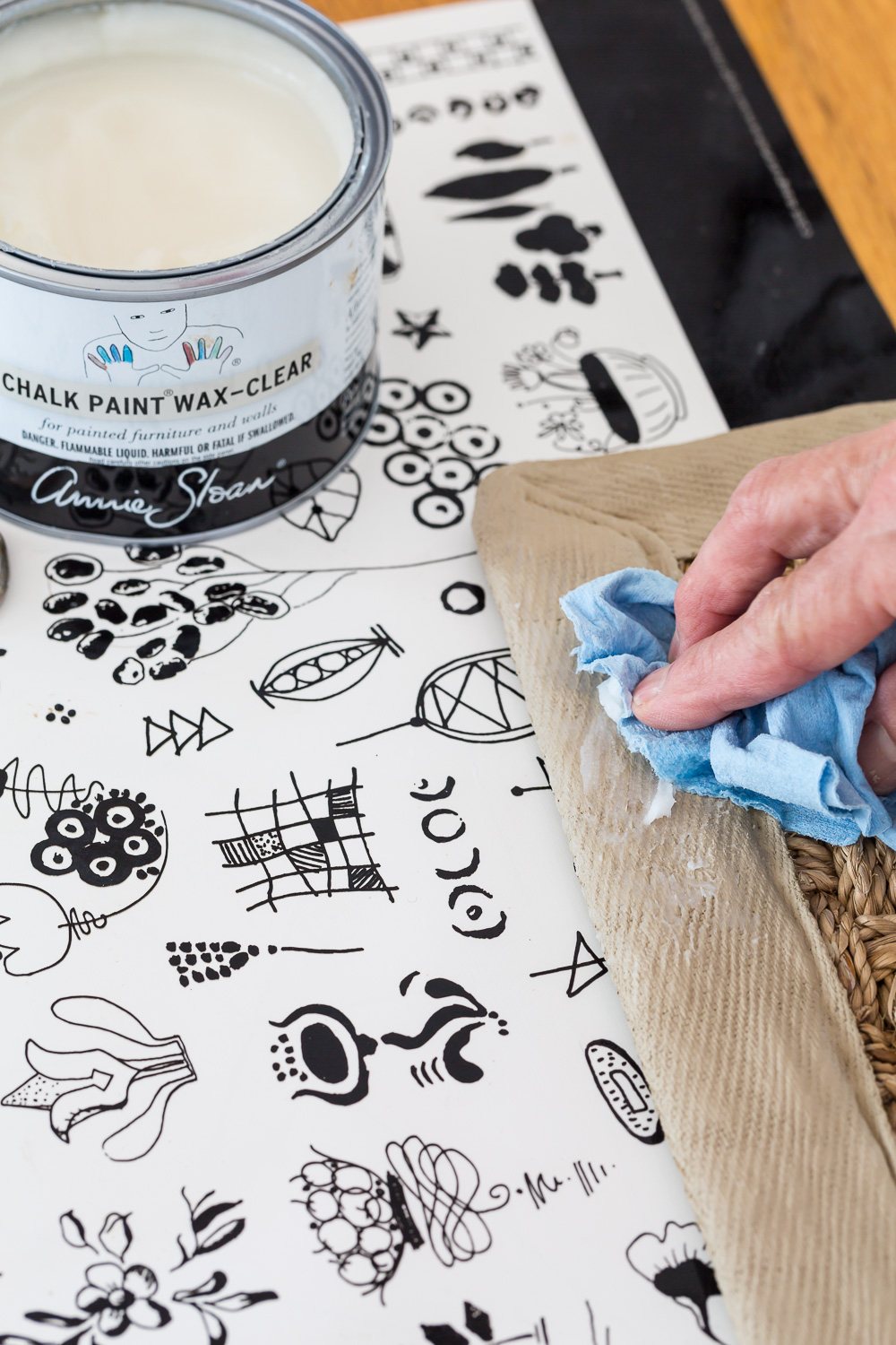 How to seal the newly painted border fabric on a seagrass rug with paste wax.