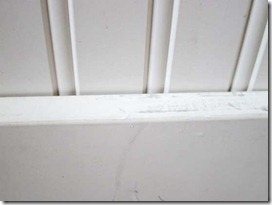 applying-caulk-against-bead