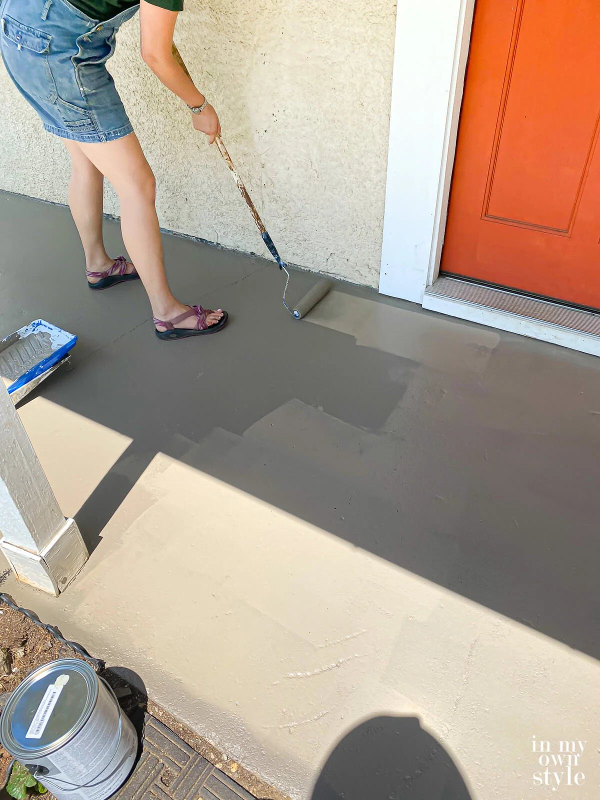 How to paint a concrete porch floor using a paint roller on a pole.