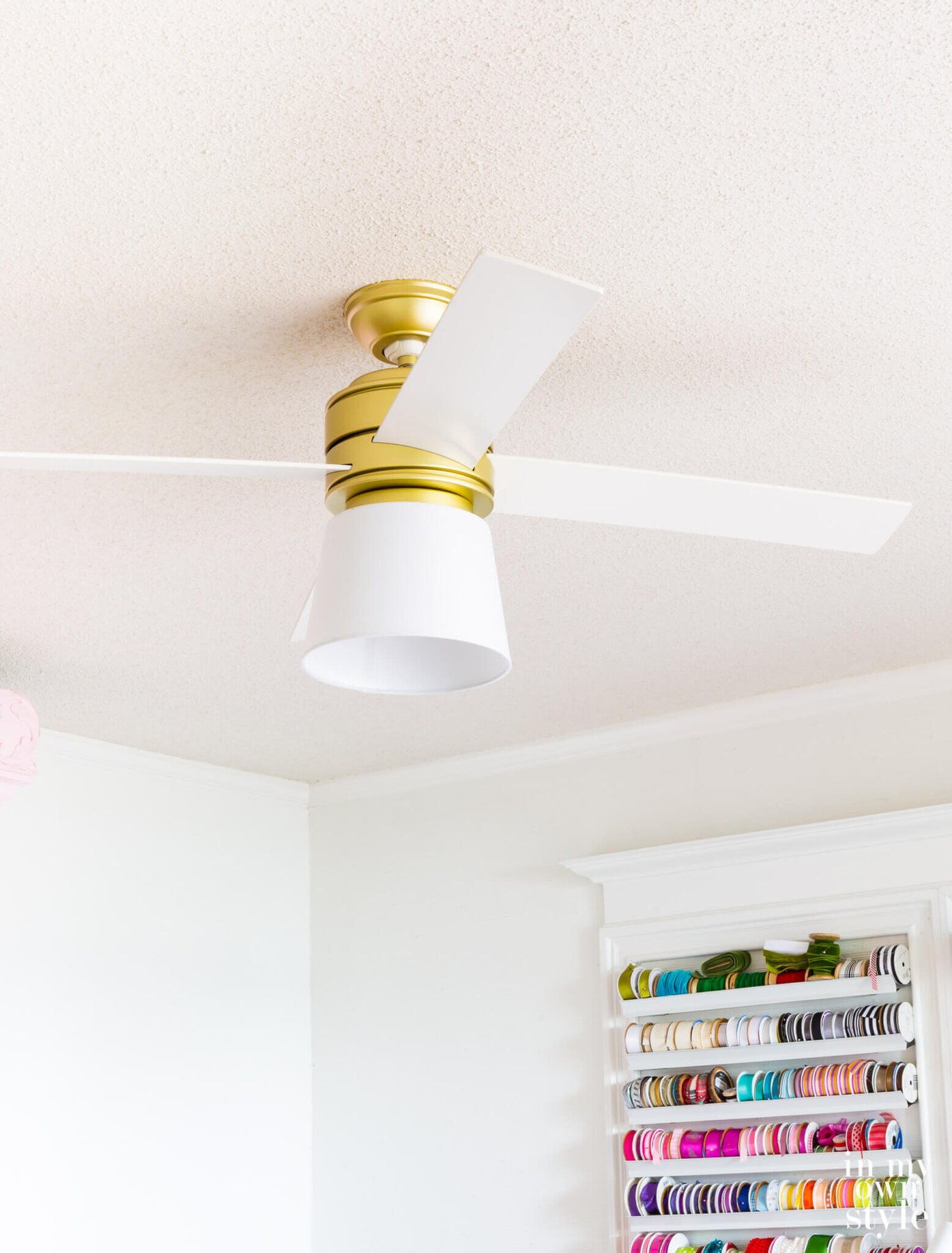 Close up of new lampshade on Hunter Hepburn ceiling fan.