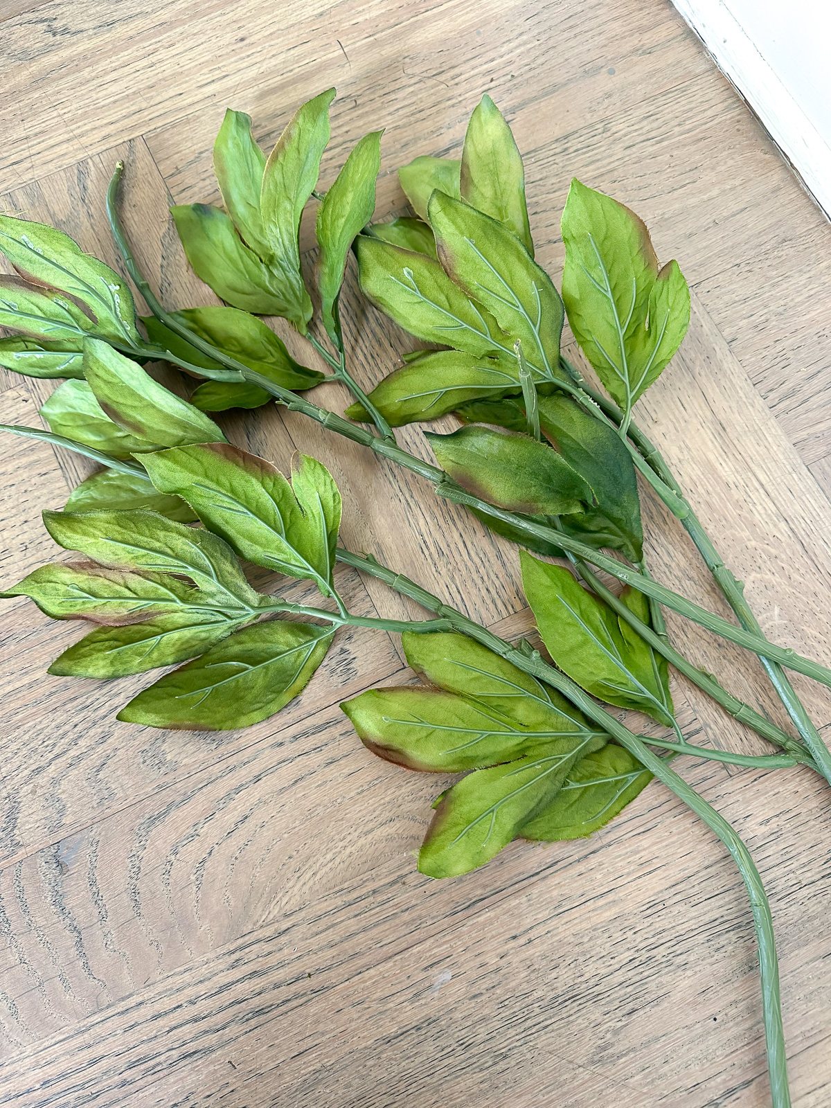 faux flower branch stems with flower heads removed