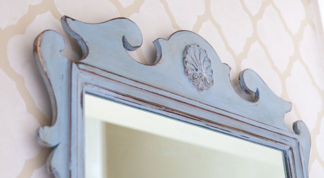 Dark wax over paint on mirror