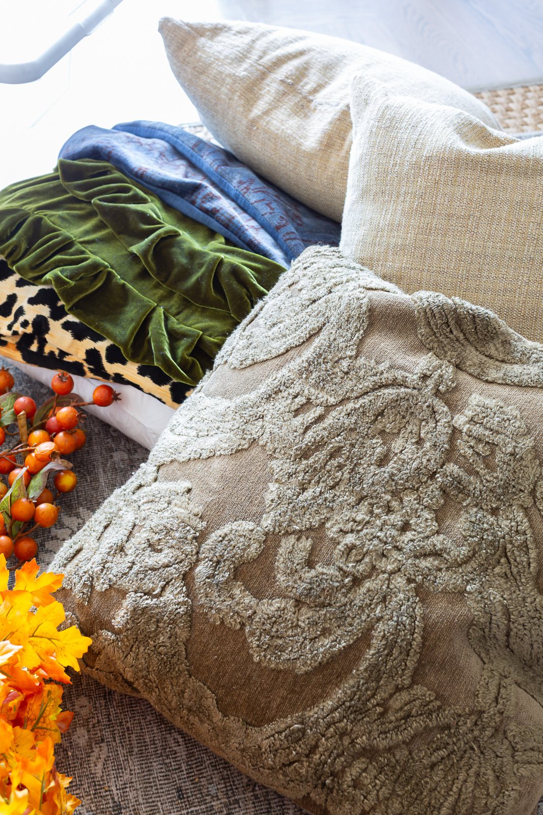 a stack of fall pillows and pillow covers