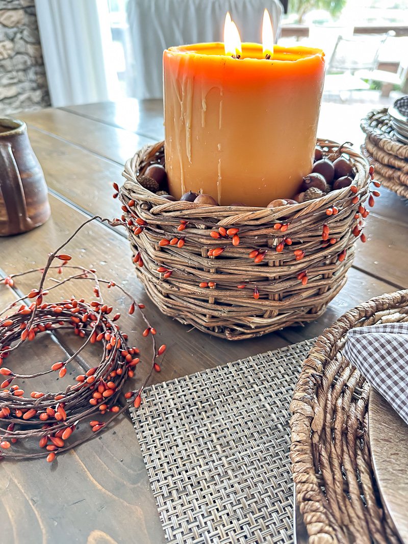 Other decorative uses for fall berries on wire. Place around wicker basket.