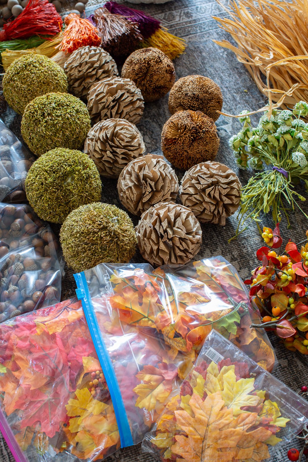 fall decor lined up on floor t