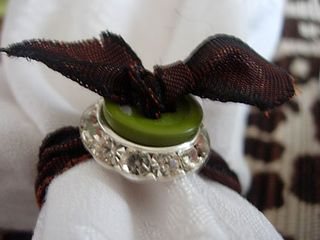 Button and ribbon napkin rings to make for a table setting