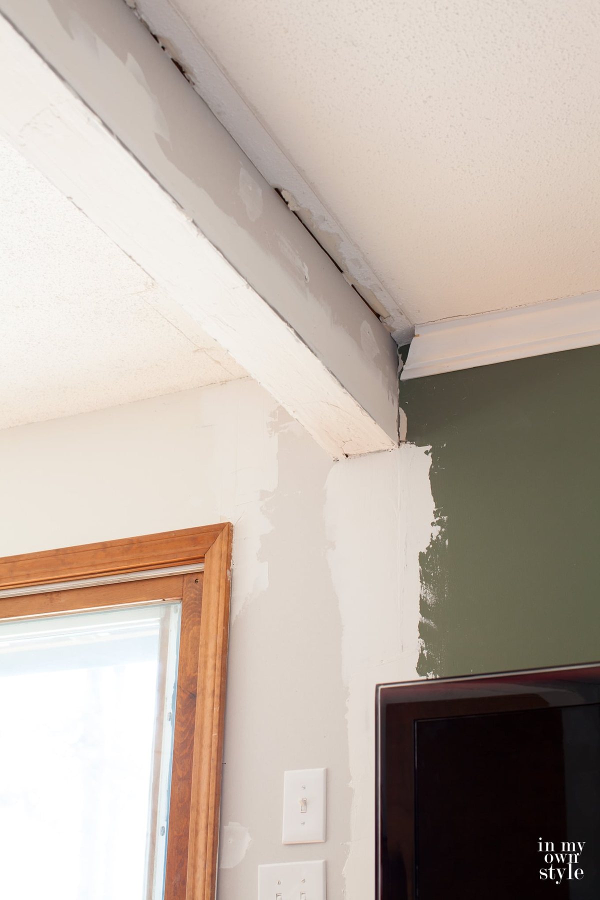Adding a ceiling beam when removing a wall between two rooms