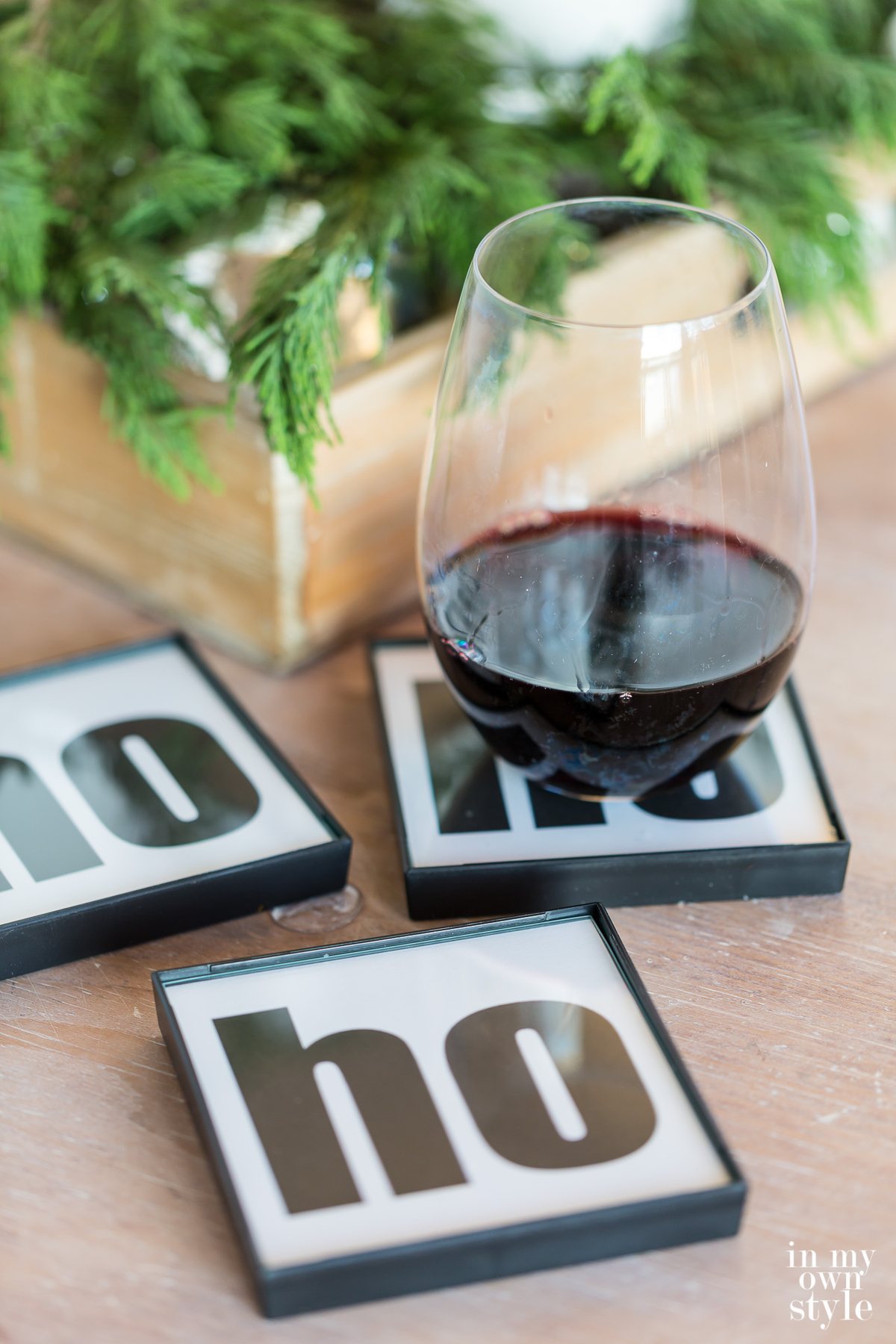 Red wine on a Ho Ho Ho Holiday drink coaster