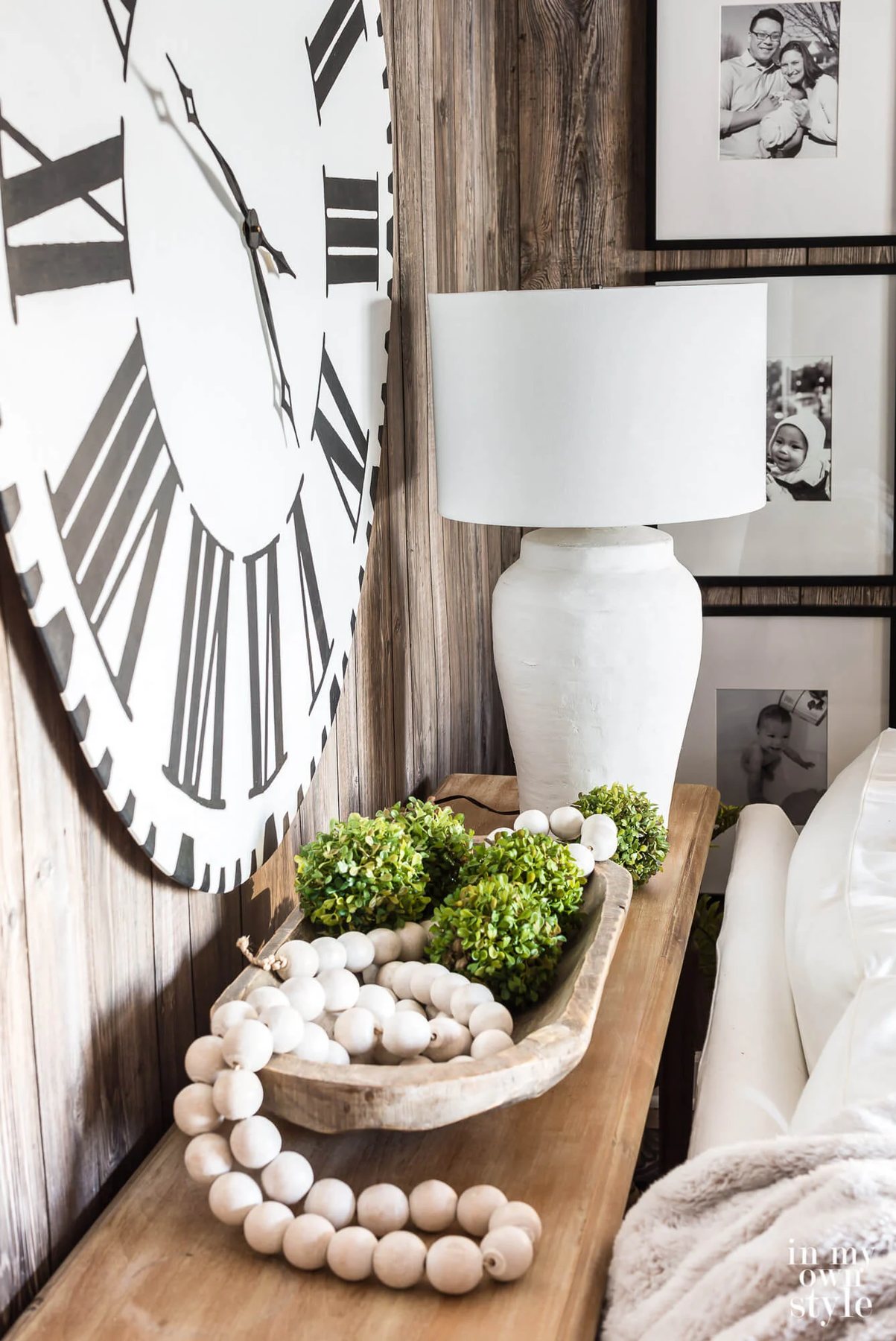 DIY makeover of an ugly table lamp. After image of the newly transformed lamp on a sofa table.