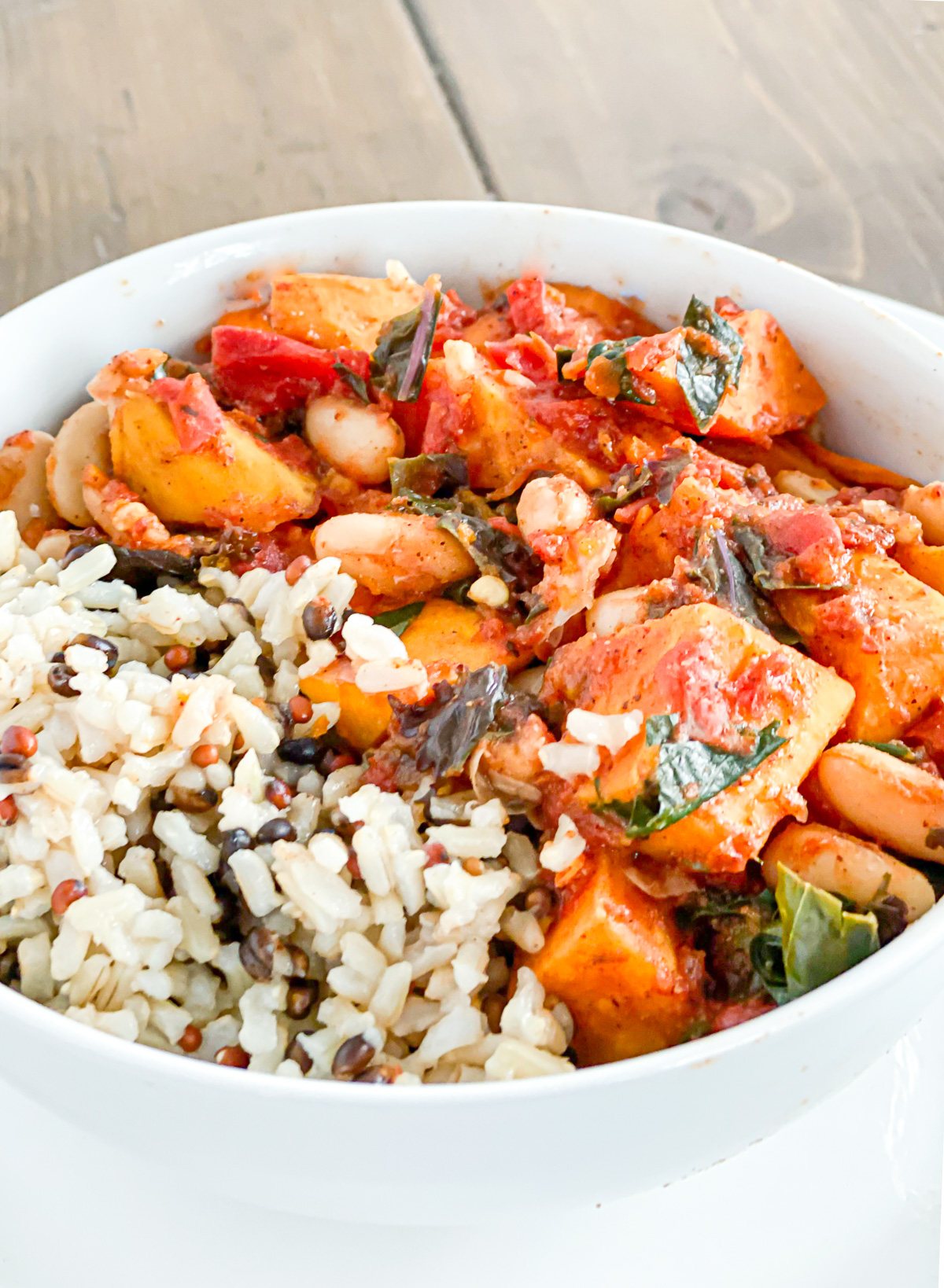 plant based chili in a bowl - kale chili with sweet potatoes